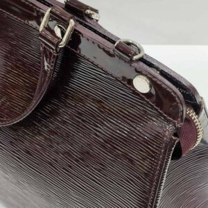 lv brea mm burgundy epi leather two way bag