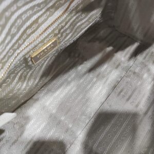 prada white/pink perforated boston bag