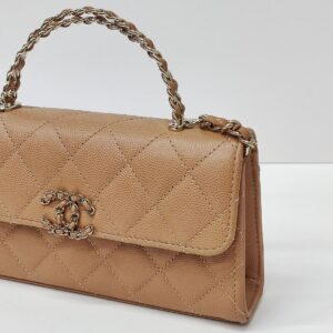 chanel kelly clutch top handle tan caviar microchipped